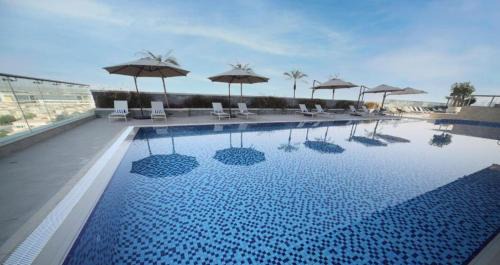 Jumeirah Village Triangle Apartment | Vogue One Bedroom Apartment at Novotel Jumeirah Village Triangle, 16th Floor Skyline View and Balcony, Pool and Gym Access Included
