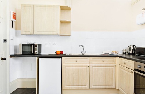 Torquay City Centre Apartment | Vomero Holiday Apartments: Ground Floor Garden View & Terrace Apt Torquay Devon