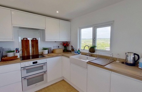 Hayle Ski Chalet | Vu an Tecca enjoys spectacular sea views and is newly refurbished.