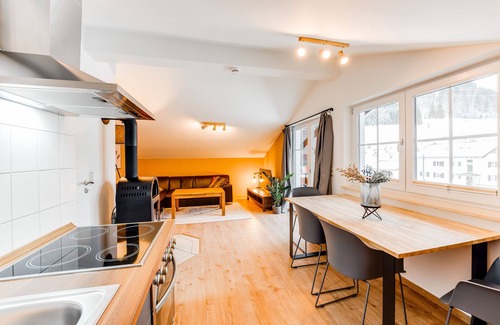 Unterjoch Apartment | VYLD: Eagle view mountain view and fireplace