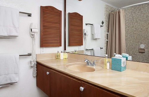 Poipu Condo | Waikomo Stream Villas #103 By Parrish Kauai: great value lush garden views, only