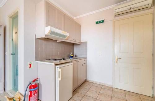 Gaios Apartment | Wake up to stunning sea views at Paxi Apartment in the heart of Gaios