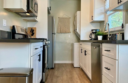 San Clemente Apartment | Walk to beach-private yard w/spa, fire pit, AC & more in downtown San Clemente!