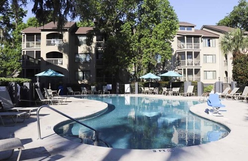 North Forest Beach Cottage | WALK TO THE BEACH! 3 Bedroom Cottage at Port O' Call in HHI'S LUXURY RESORT