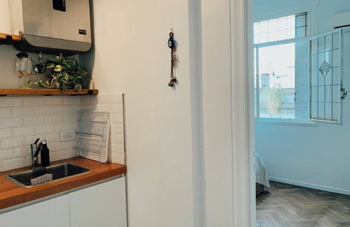 Buenos Aires Central Business District Apartment | Warm study in the Historic District of San Telmo