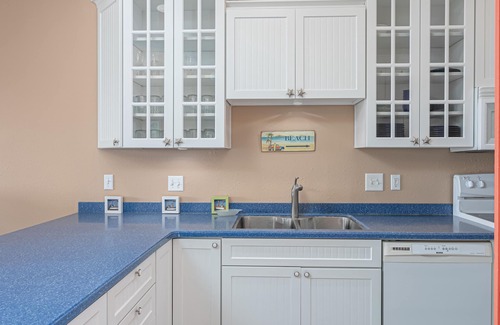 Pensacola Beach Condo | Watch the Sailboats Skim the Bay: Covered Parking out of the sun - Baywatch E7