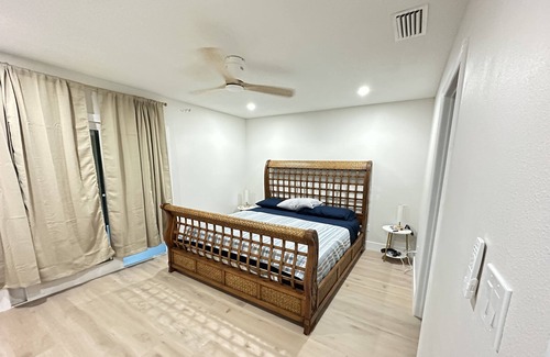Interchange Square House | Water front Canal pool home 3+ bed 2 bathroom home sleeps 8 semi private