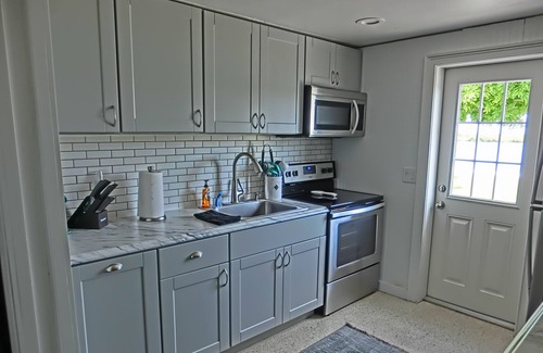 Spring Hill House | Water Front Home With Amazing Views, Sunsets & a Beach House Feel