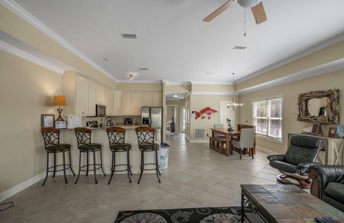Orange Beach Villa | Water front home with boat dock, boat use, fishing swimming biking & more