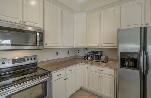 Orange Beach Villa | Water front home with boat dock, boat use, fishing swimming biking & more