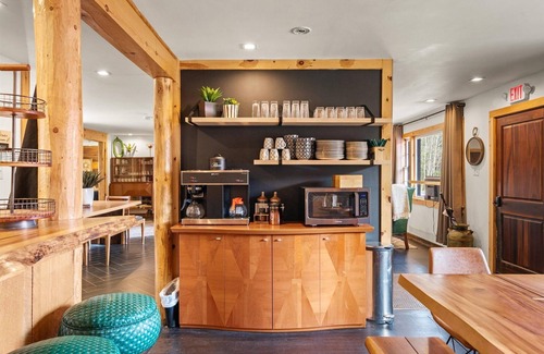 Hancock House | Waterfall Retreat | Serene Room with Forest Mural at Green Acres Retreat