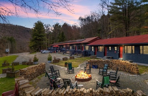 Hancock House | Waterfall Retreat | Serene Room with Forest Mural at Green Acres Retreat