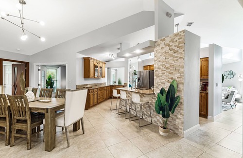 Pelican House | Waterfall saltwater Lagoon heated pool, 2 King Suites, Sauna!