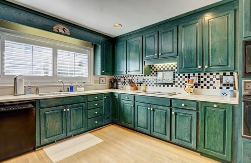 South End House | Waterfront 5 BR home w/incredible views, dock, boat slips, & elevator!