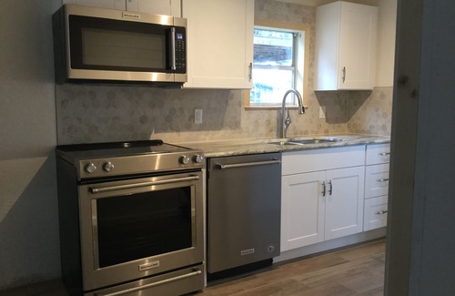 Graford House | Waterfront Cabin with Boat Dock steps from the deck