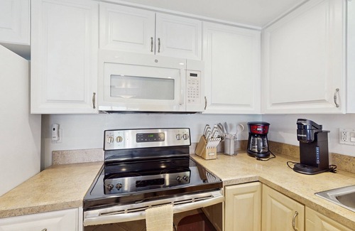 New Smyrna Beach Condo | Waterfront condo with pool,beach access, and resort amenities