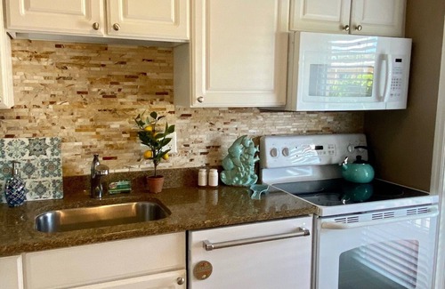 Indian Shores Condo | Waterfront Condo - Plush Furnishings - White Sandy Beaches - Corner Unit