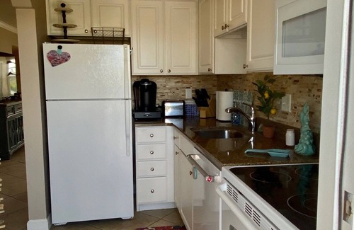 Indian Shores Condo | Waterfront Condo - Plush Furnishings - White Sandy Beaches - Corner Unit