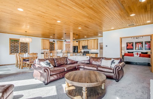 Eagle River House | Waterfront condo with lake views, boat slip, grill, beach, AC, fireplace, & WiFi