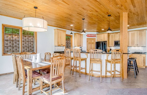 Eagle River House | Waterfront condo with lake views, boat slip, grill, beach, AC, fireplace, & WiFi