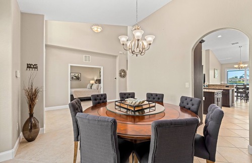 Burnt Store House | Waterfront dog-friendly house with pool, dock, pool spa, patio & sunrise views