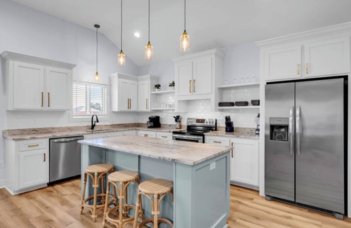 Shoreline Park House | Waterfront Escape in Bay STL with dock, ping pong, basketball, cornhole & more!