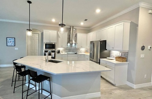 South Gulf Cove House | Waterfront, gated community, heated pool & spa, boat lift, Gulf access, home gym