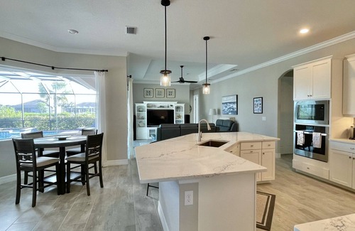 South Gulf Cove House | Waterfront, gated community, heated pool & spa, boat lift, Gulf access, home gym