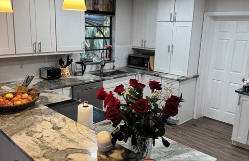 Eustis House | Waterfront Getaway Sauna Hot Tub Jet Skis Sunset Views