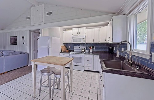 East Falmouth House | Waterfront Getaway w/Private Dock, Deck, Central A/C, & Kayaks