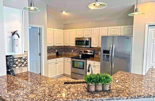 The Villages House | Waterfront, Heated Pool, Golf Cart, & 2 King Beds