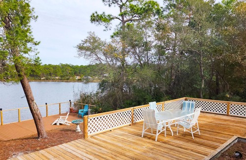 West Panama City Beach House | Waterfront home on Lake Powell with private dock & great deck - near beach & 30A