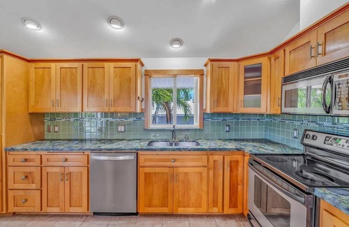 Eden Pines House | Waterfront Home with easy access to Pine Channel. Wi-Fi, 60ft seawall, Tiki Hut