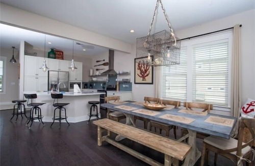 Navarre Beach House | Waterfront Home with Golf Cart, Kayaks, Bikes and Paddleboards!