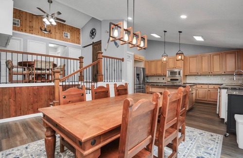 Montgomery House | Waterfront house with a large deck and dock for boat or fishing