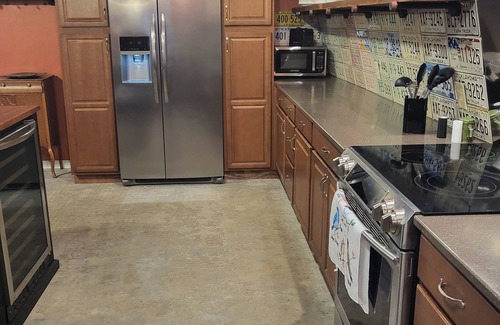Eufaula House | Waterfront industrial-farmhouse with wine fridge, hot tub, firepit, sleeps 8