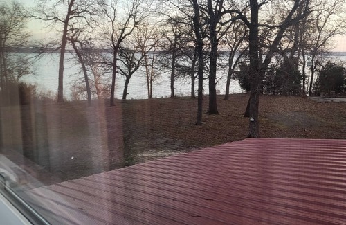 Eufaula House | Waterfront industrial-farmhouse with wine fridge, hot tub, firepit, sleeps 8