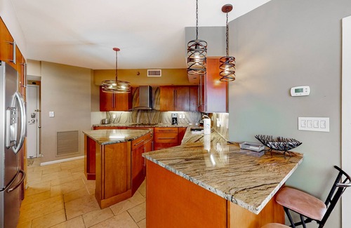 Orange Beach Condo | Waterfront oasis with direct beach access, pool, hot tub, & gym