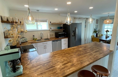 Topsail Beach House | Waterfront South End Serenity! Bring your boat and your pup, leave the linens!n