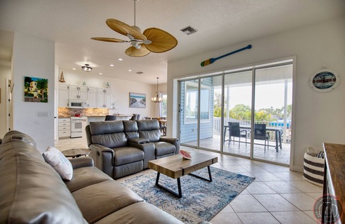Englewood House | Waterfront Tropical Paradise, 5mins. to beach, pool/hot tub, game room, kayaks