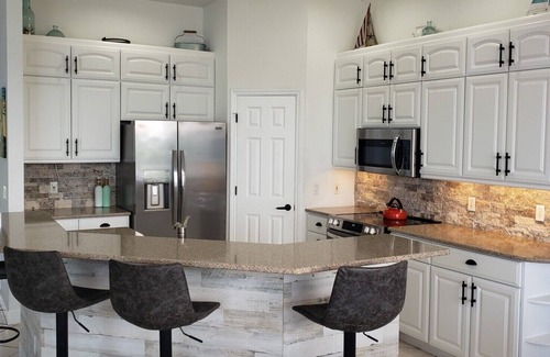 Englewood House | Waterfront Tropical Paradise, 5mins. to beach, pool/hot tub, game room, kayaks