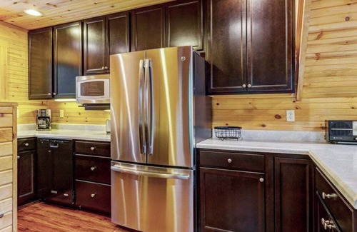 Wright City Cottage | Waterside Cottage w/Hot Tub by StayLage