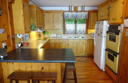 Raymond Cabin | Welcome to Dorie's Cottage! Cozy waterfront home with gorgeous sunset views!