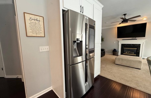 Greensboro House | Welcome to The Clovelly, a spacious 2-story vacation home that blends charm with modern comfort. Perfect for families, friends, or groups, this cozy retreat features inviting living spaces, a fully equipped modern kitchen & comfortable bedrooms.