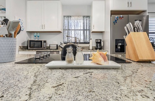 Cypress Lake Condo | Welcome to your Fort Myers retreat! This charming condo at The Club at Crystal Lake is perfectly located — just minutes from Fort Myers Beach, Sanibel & Captiva Islands, shopping, dining, and easy access to RSW International Airport.