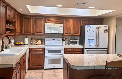 Sunrise Presidio Townhomes House | Welcoming hillside home with city and mountain views