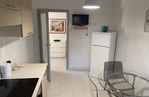 San Vincenzo Apartment | West garden: basement within walking distance of the sea