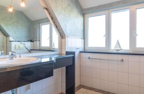 Buschvitz Apartment | Whg-4-Adlerhorst-Ferienhaus-Am-Boddenufer-Buschvitz