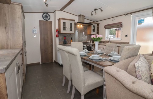 Cayton Bay Cottage | WHISPERING WILLOWS, pet friendly, with a garden in Cayton Bay