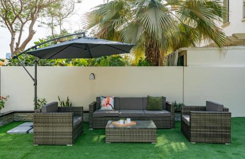 Emirates Hills Villa | White Sage Brand New 3BR Villa with Garden and Two Balconies